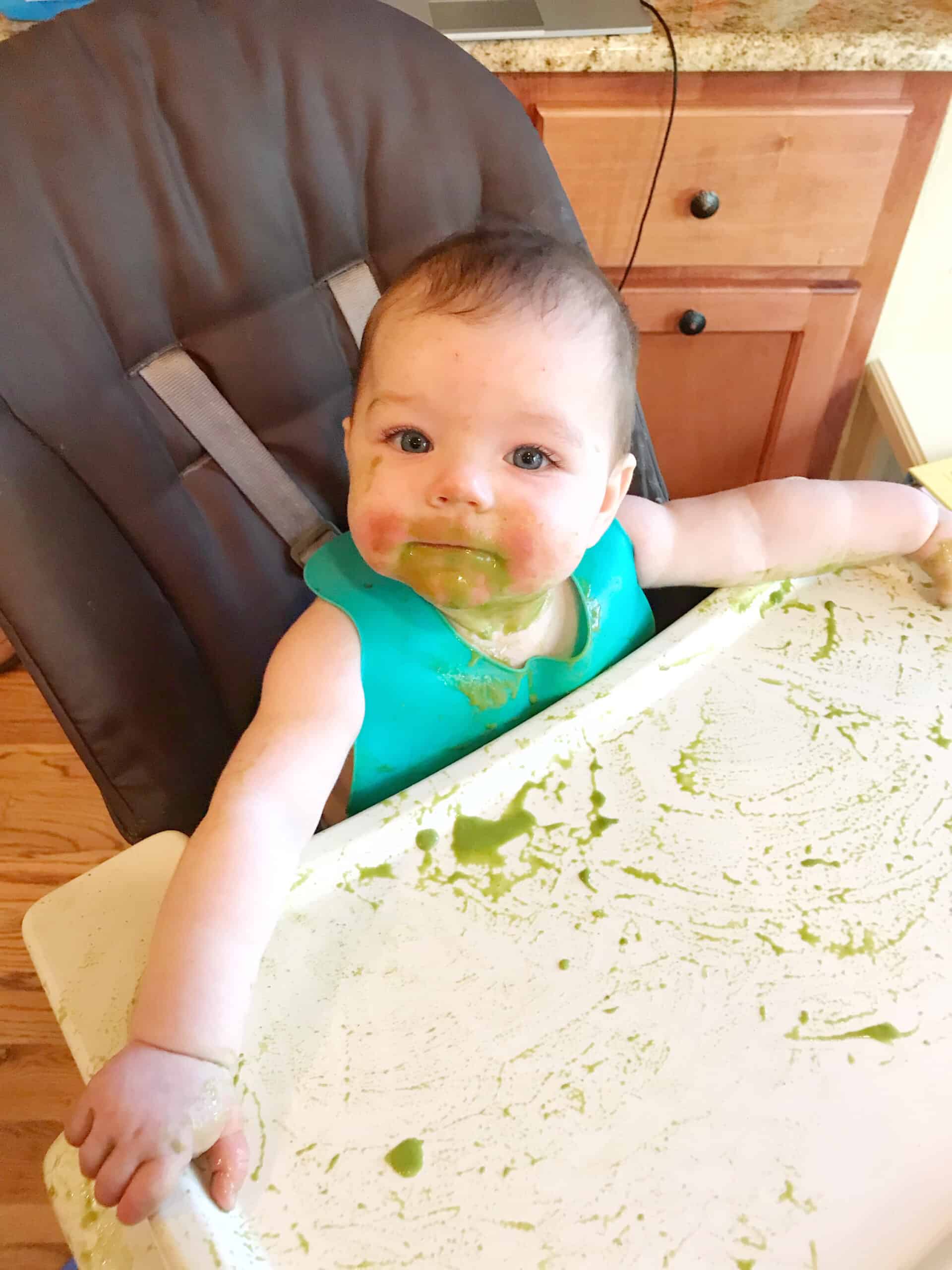 baby eating spinach puree baby led weaning 