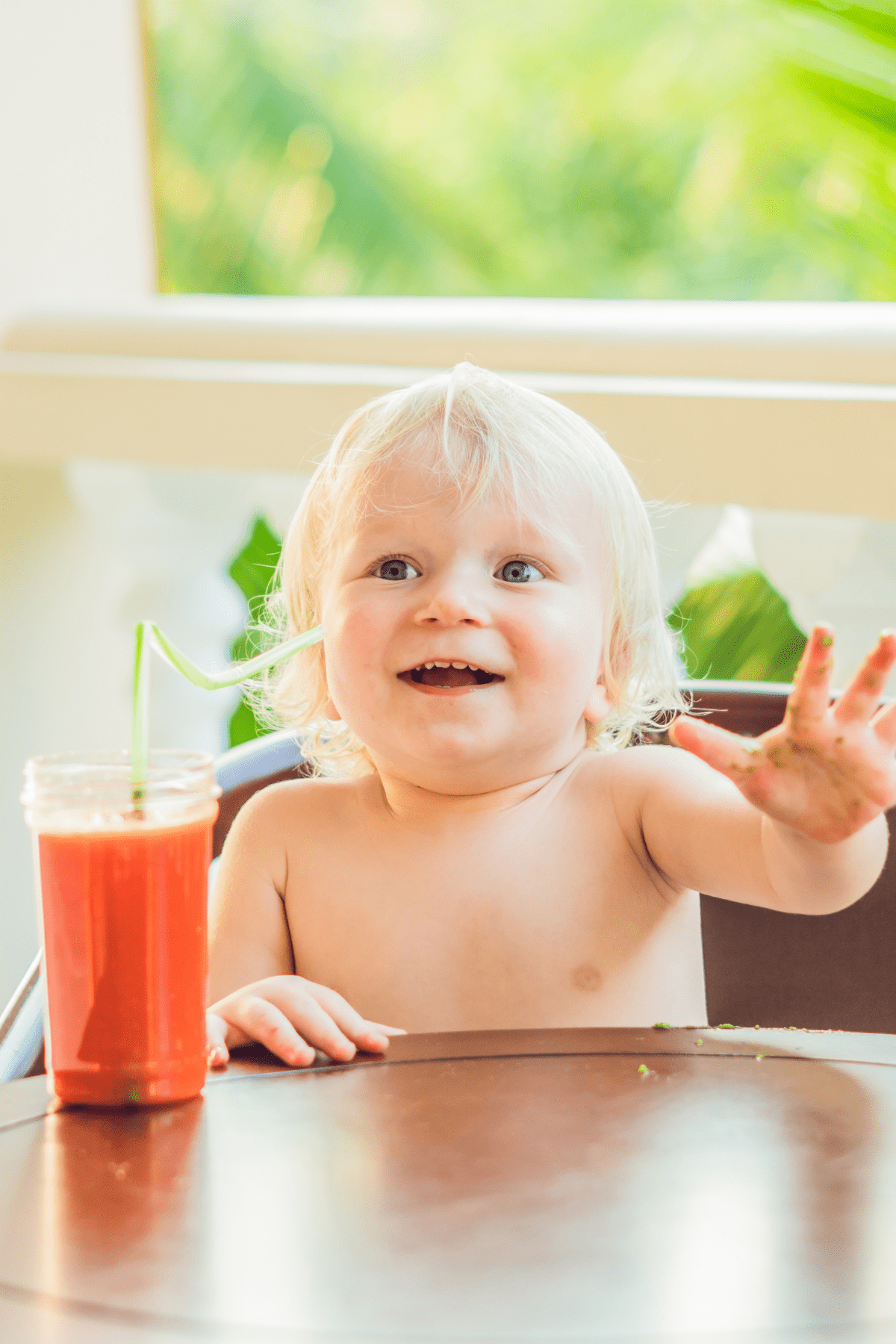 baby with a smoothie