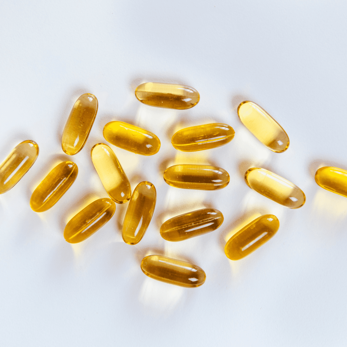 Omega-3 supplements on a white background.