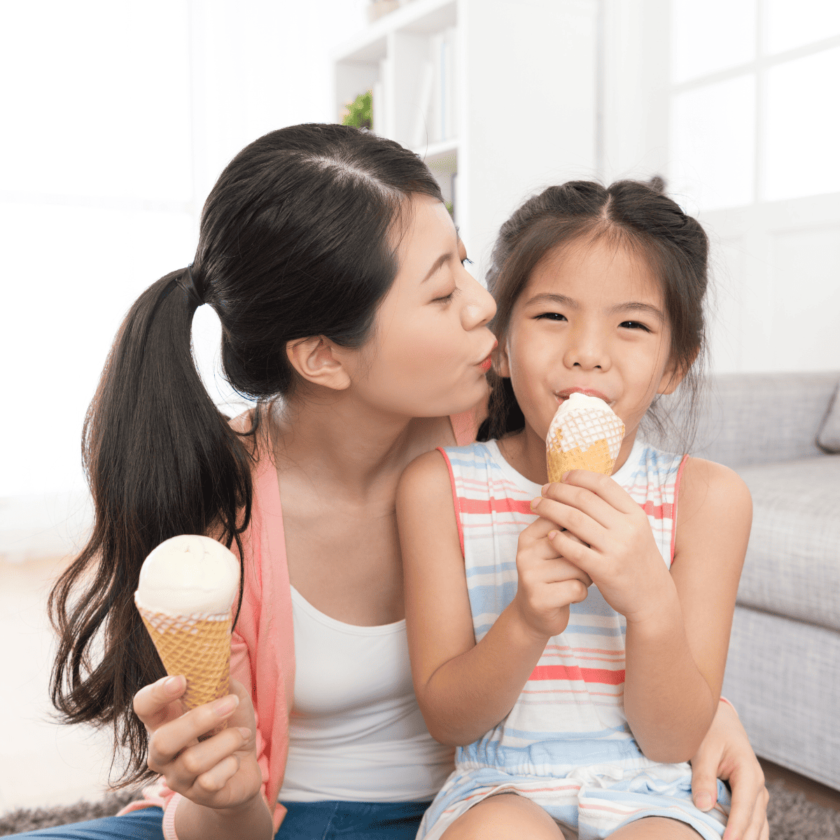 mom and daughter eating ice cream cones