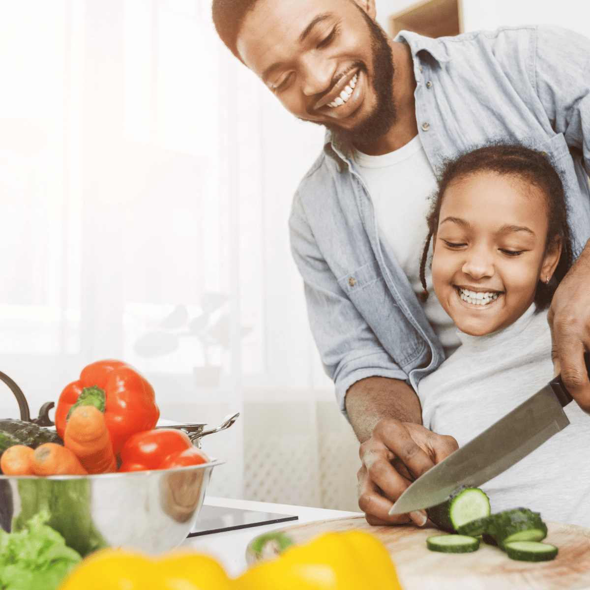 dad and daughter prepping food together