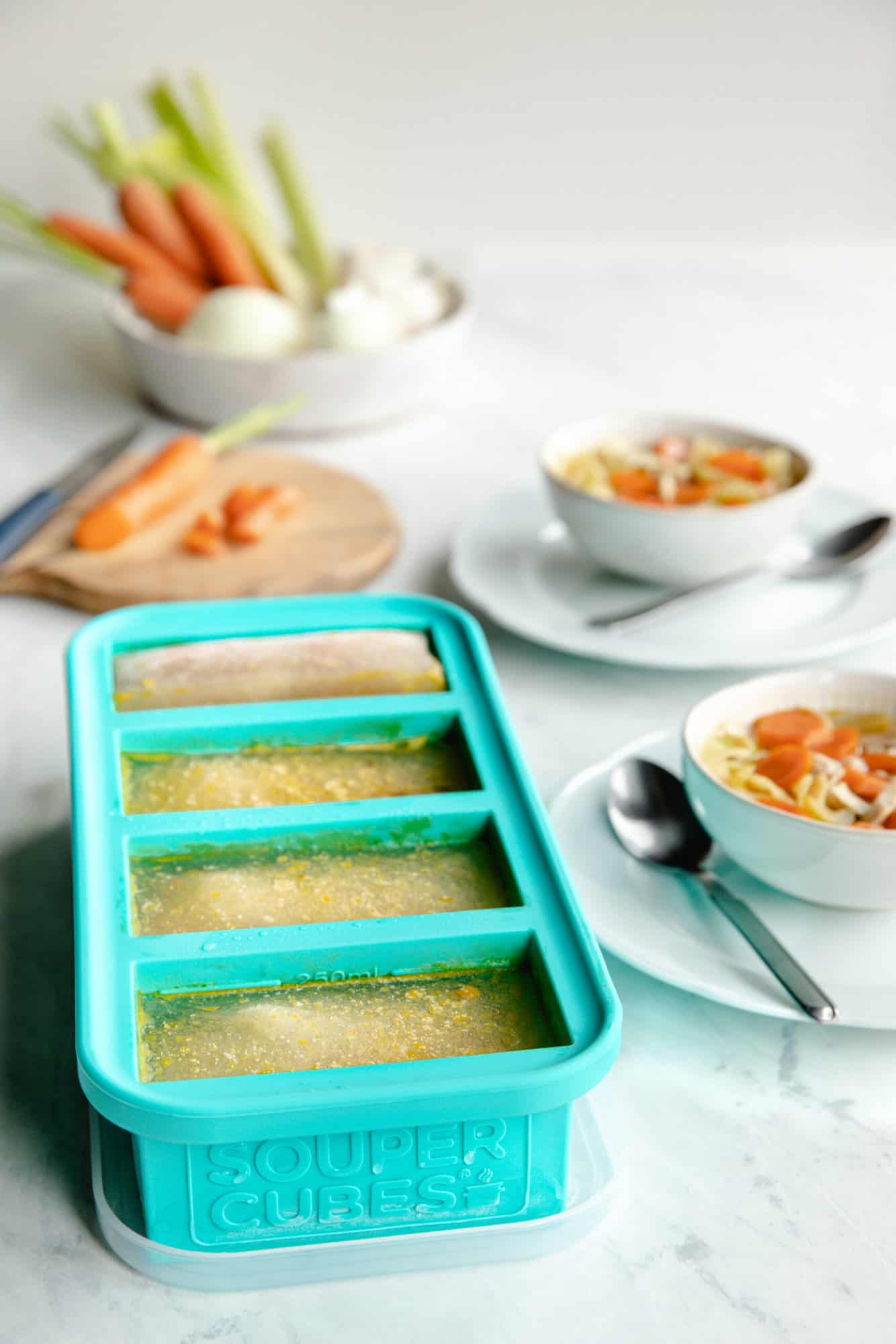 souper cubes with frozen broth and soup to freeze leftover soup