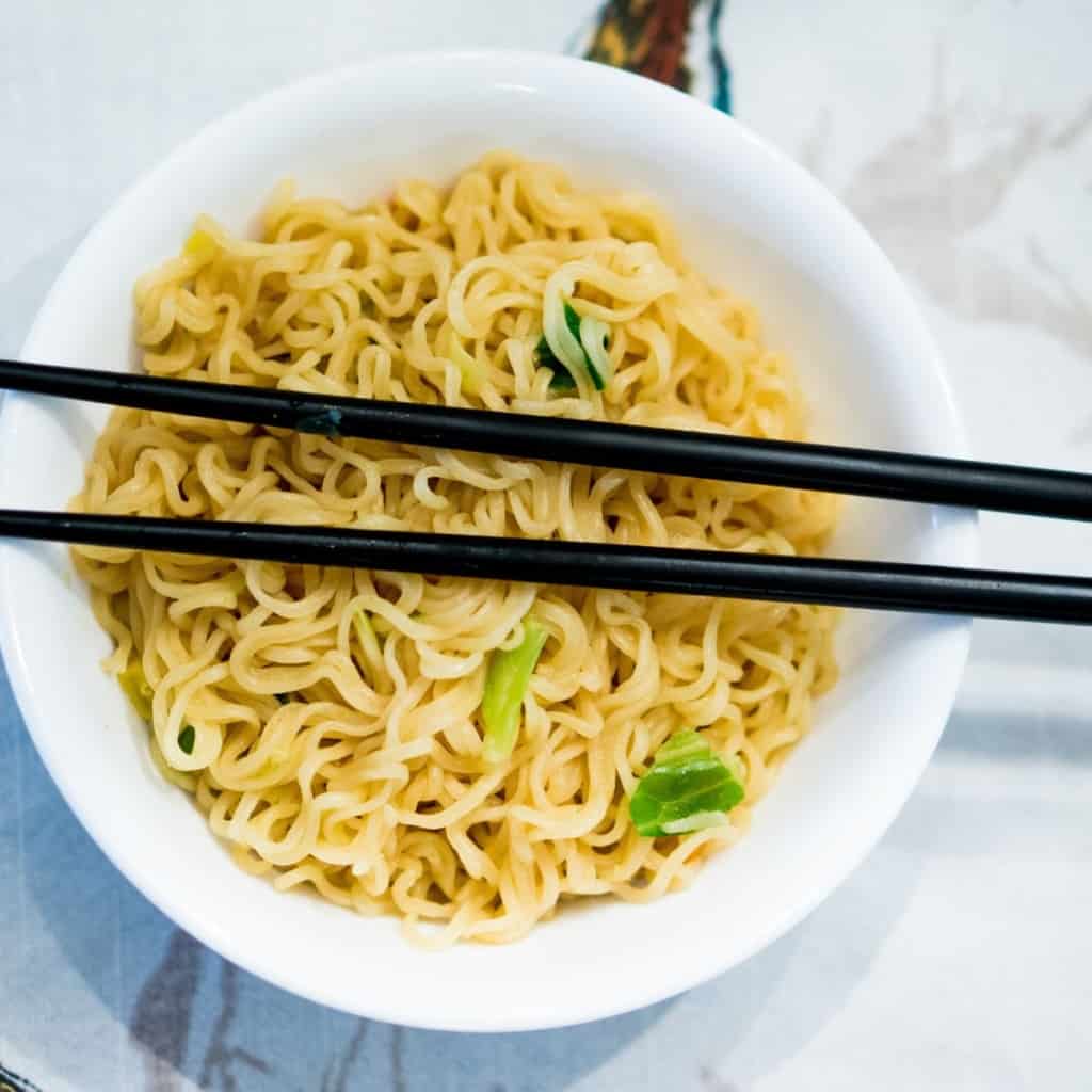 healthier ramen for kids with bone broth in bowl with chopsticks