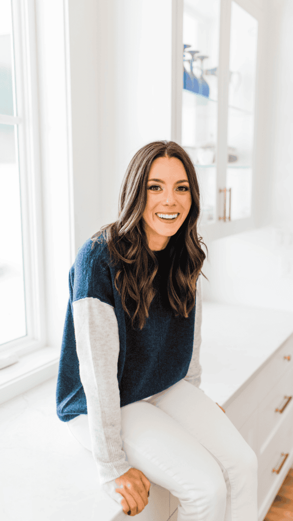 Kacie Barnes Sitting on Kitchen Counter