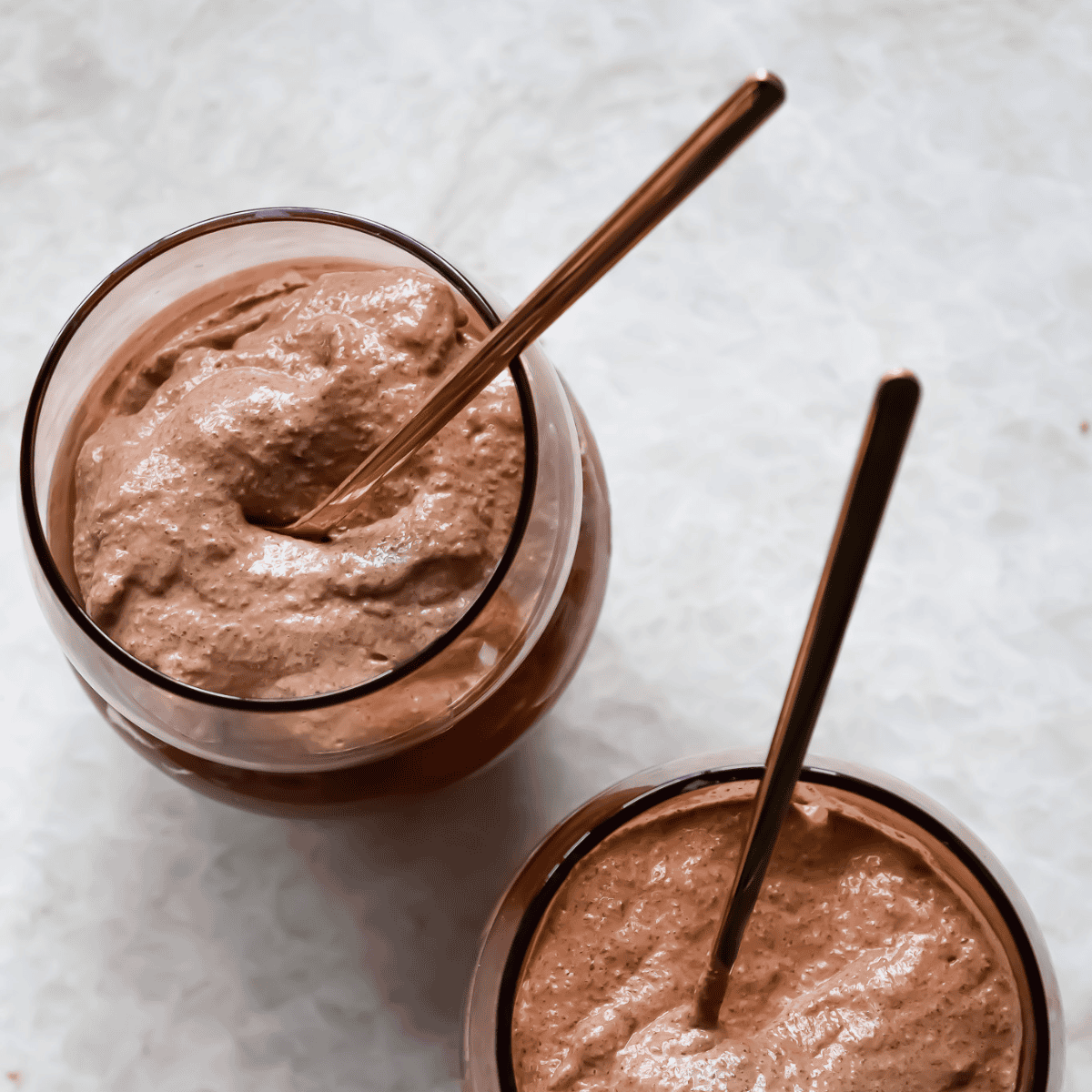 birds eye view of chocolate chia seeding pudding cups