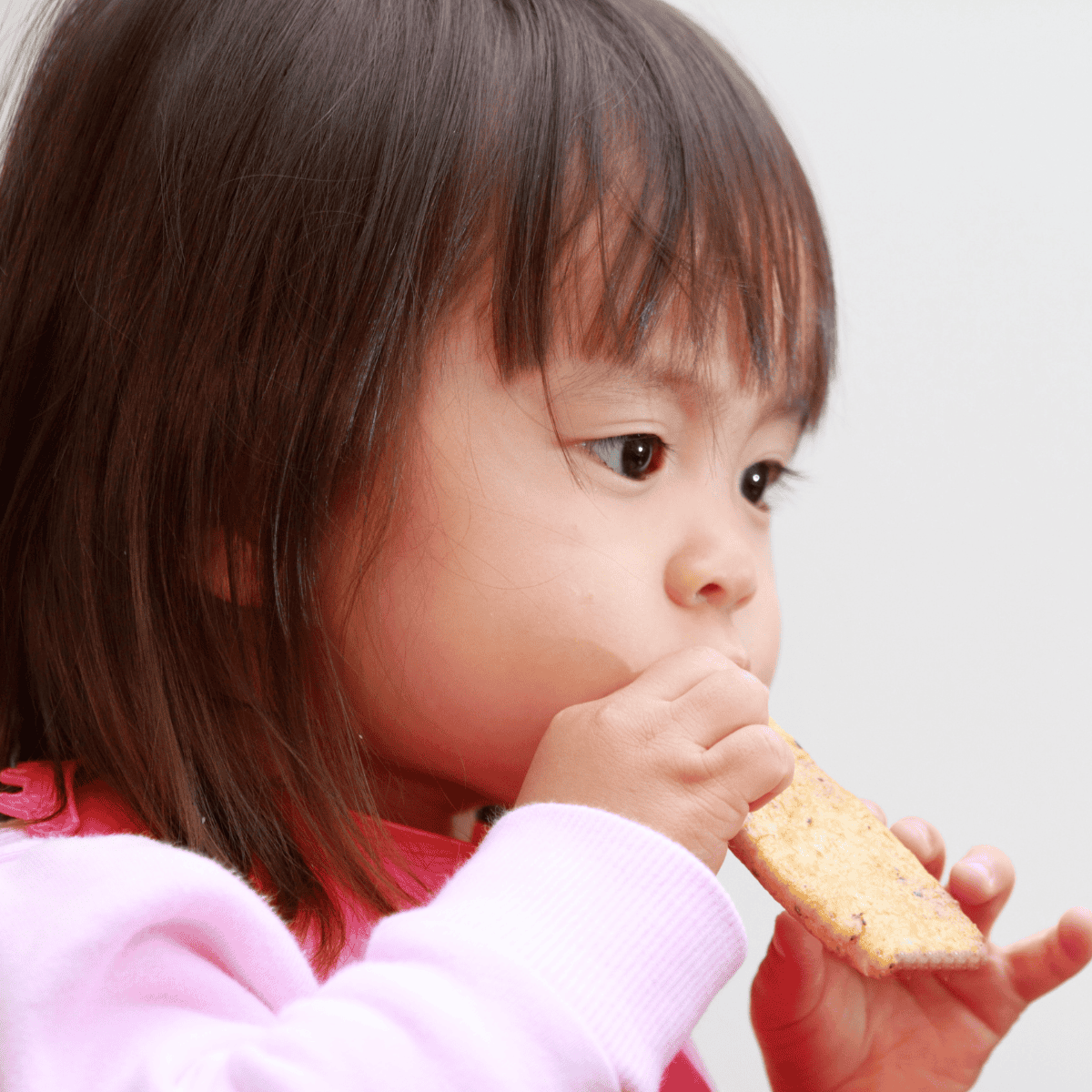 child eating cracker