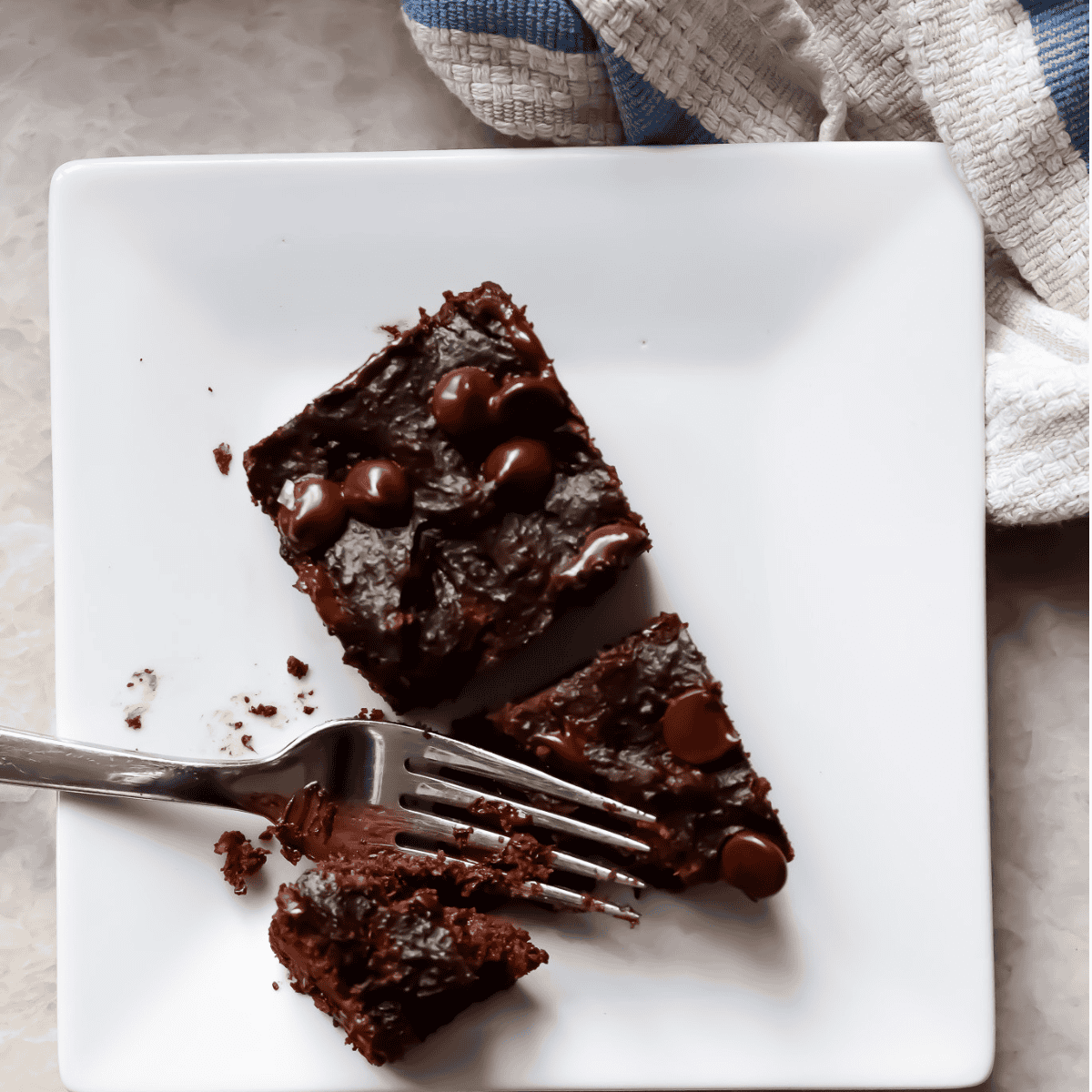 birds eye view of plated squares of sweet potato brownies