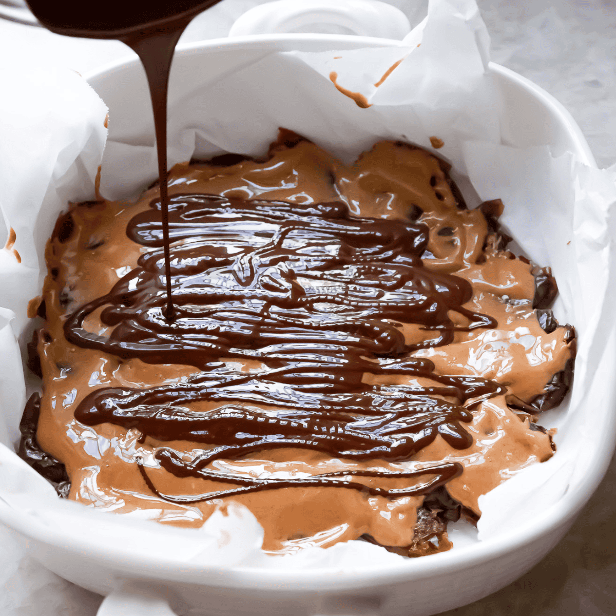 chocolate drizzle over top of dates and nut butter